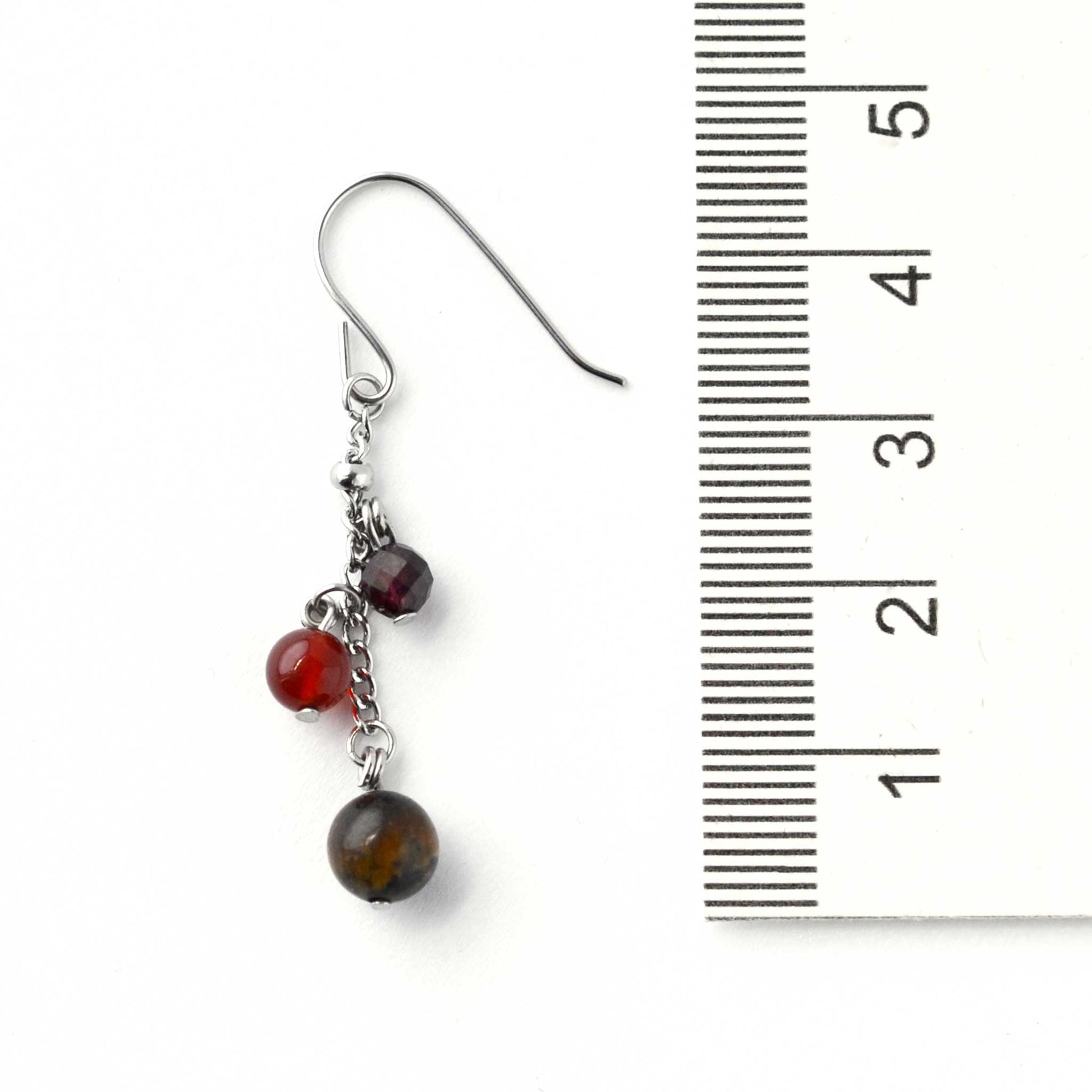 Brown, orange and red gemstone bead drop earring next to ruler showing 4.5cm length