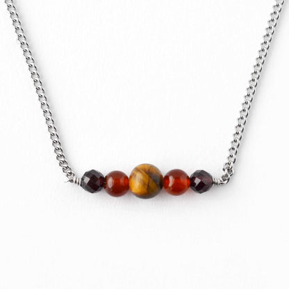 Tigers Eye, Carnelian & Garnet gemstone bar necklace on white background