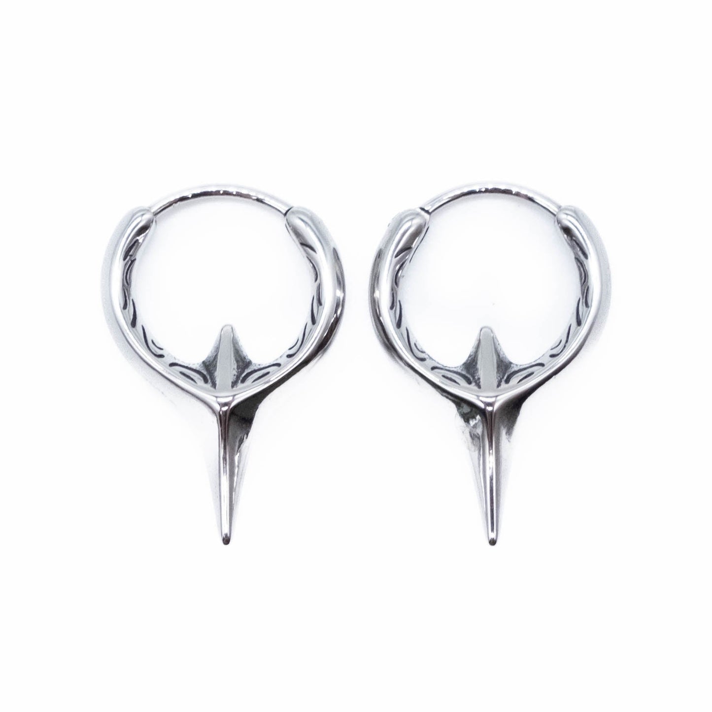 Pair of surgical steel hoop earrings on a white background