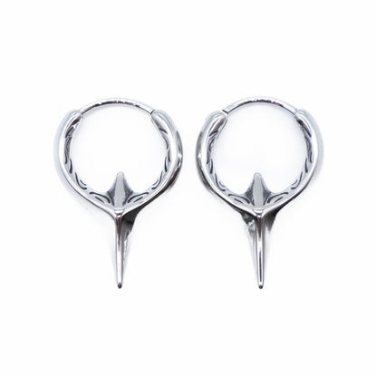 Pair of surgical steel hoop earrings on a white background