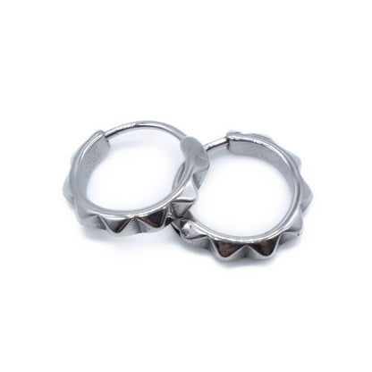 Surgical steel hoop earrings on a white background