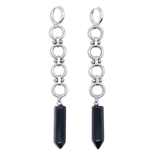 Pair of steel chain earrings with black pendant drops on a white background