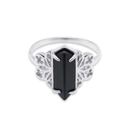 Stainless steel ring with a black gemstone on a white background