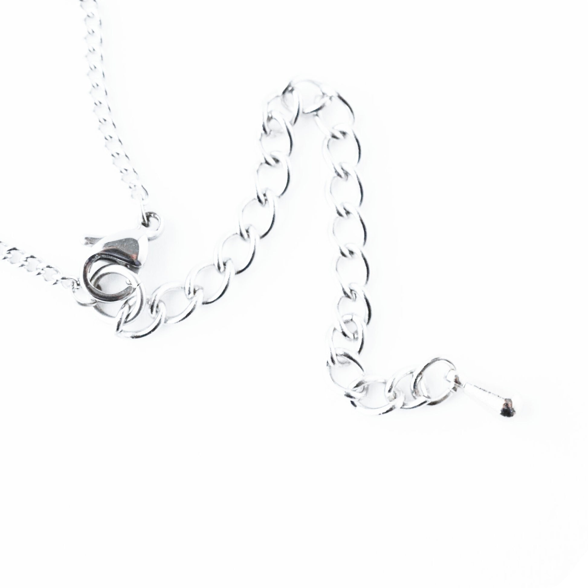 Close up of stainless steel exnteder chain with dropper.