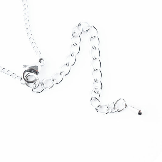 Close up of stainless steel exnteder chain with dropper.