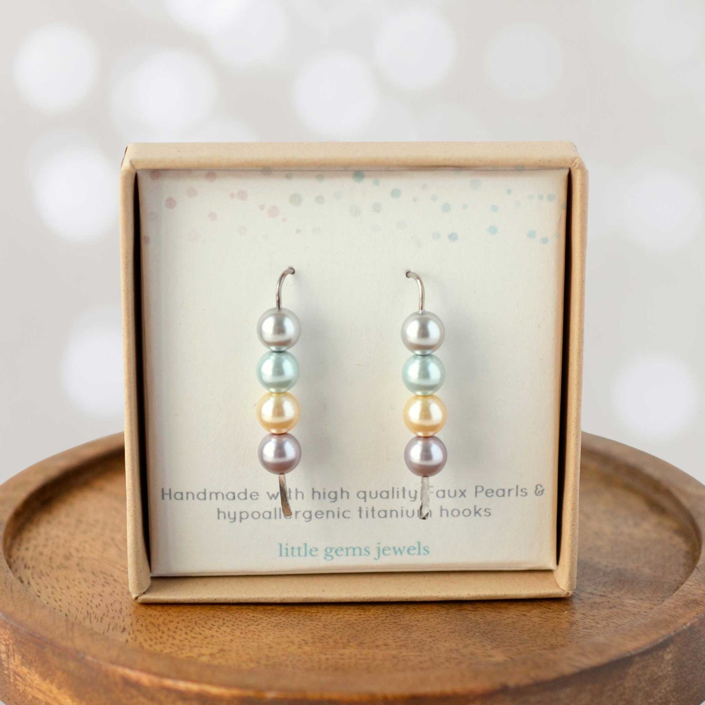 Faux pearl stack earrings in eco-friendly gift box.