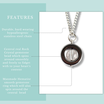 Features graphic for real Rock Crystal & Hematite fidget pendant on hypoallergenic stainless steel chain.