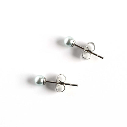 4mm Blue Faux Pearl Studs On White Background