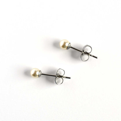 4mm Cream Faux Pearl Studs On White Background