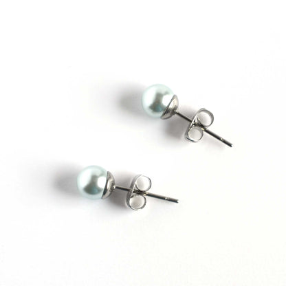 6mm Blue Faux Pearl Studs On White Background