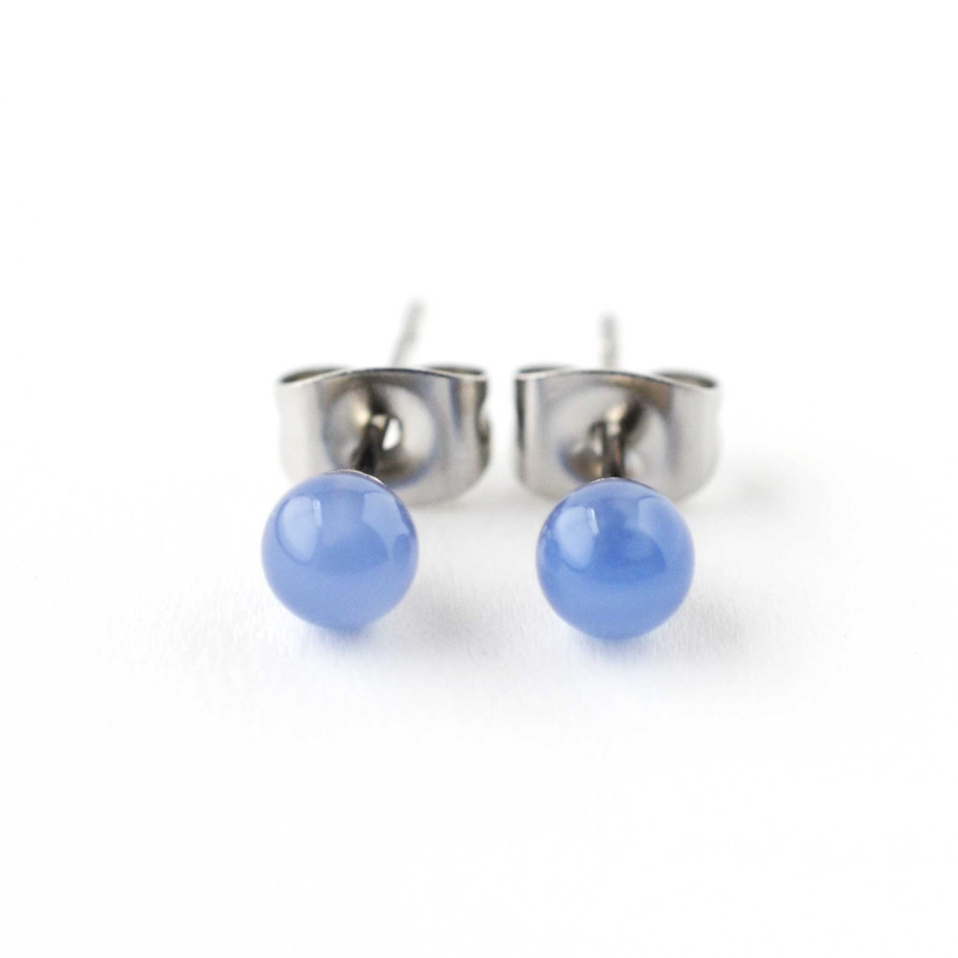 Front view of round ball Blue Onyx gemstone stud earrings