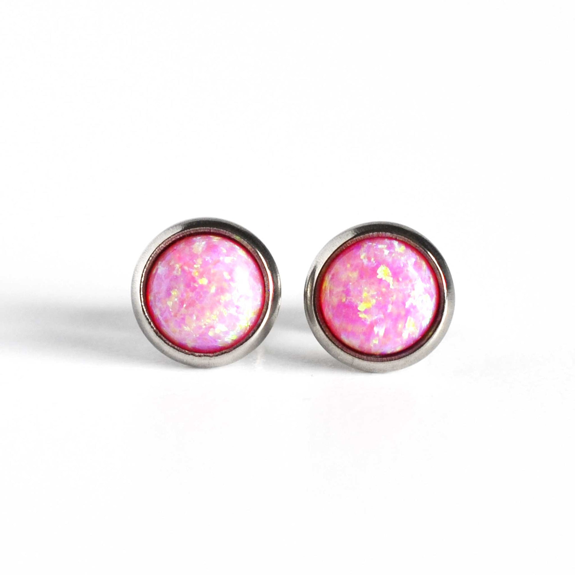 Front view of bright pink Opal stud earrings 