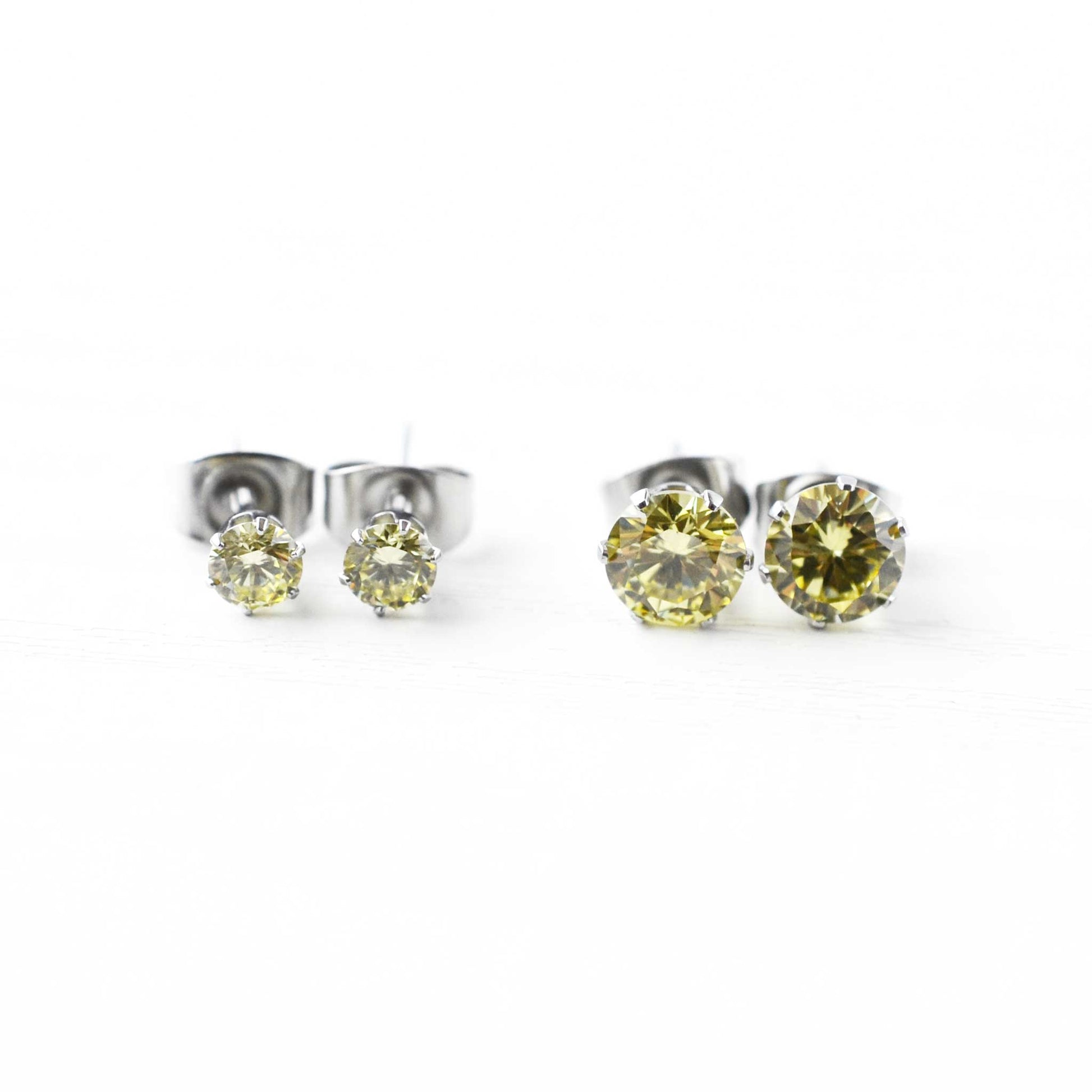 Green CZ stud earrings in 4mm & 6mm sizes