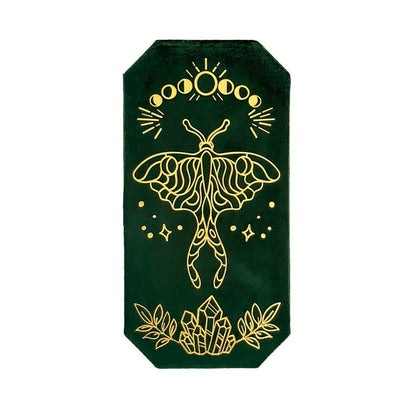 Decorative green box with gold moth design on a white background