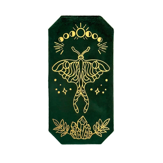 Decorative green box with gold moth design on a white background