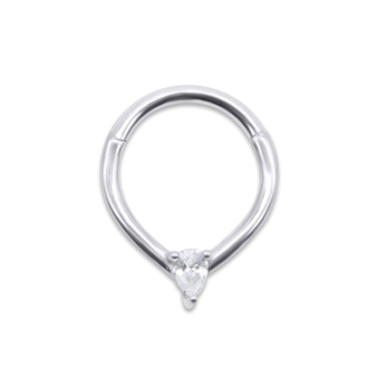 Stainless steel septum ring with a small CZ on a white background