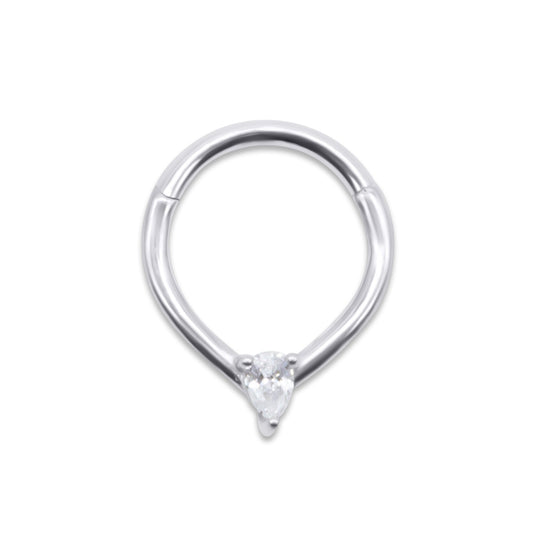 Stainless steel septum ring with a small CZ on a white background