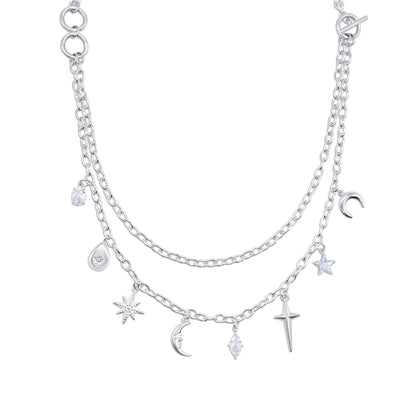 Layered stainless steel necklace with various charms on a white background