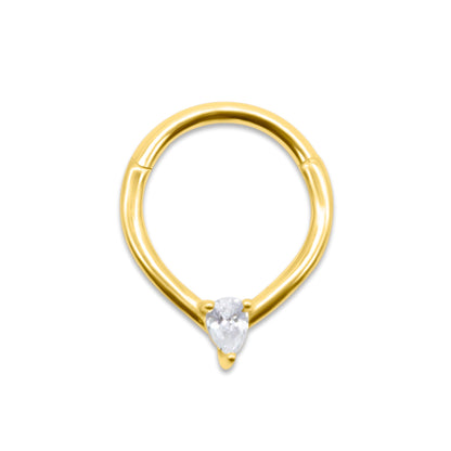Gold septum ring with a clear gemstone on a white background