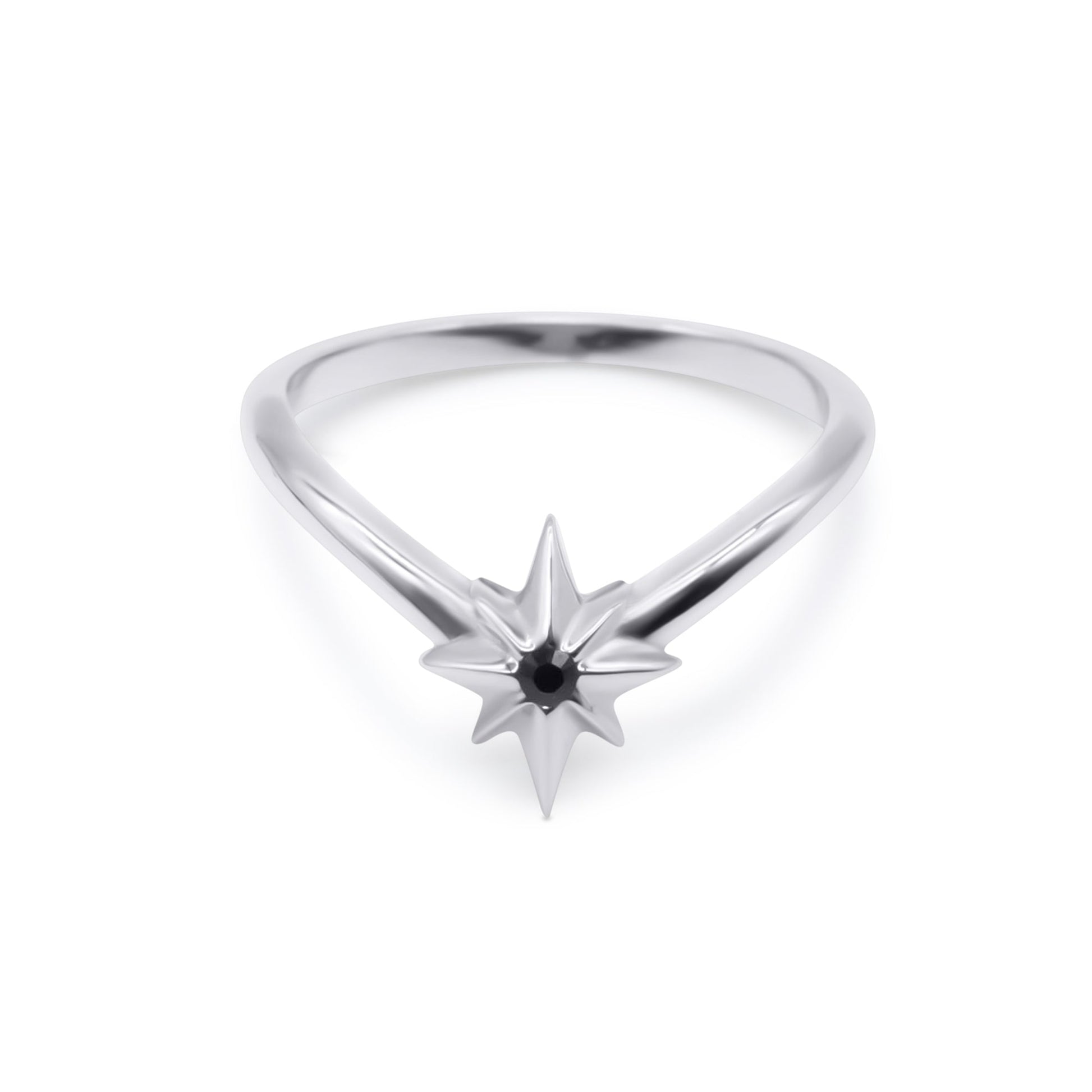 Silver ring with star-shaped design on a white background