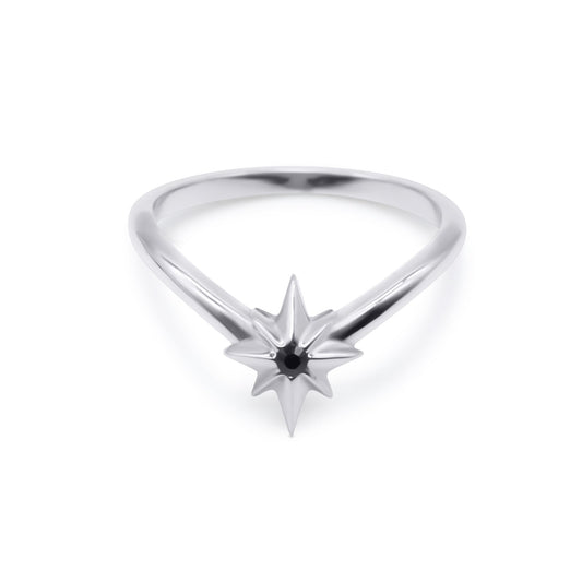Silver ring with star-shaped design on a white background