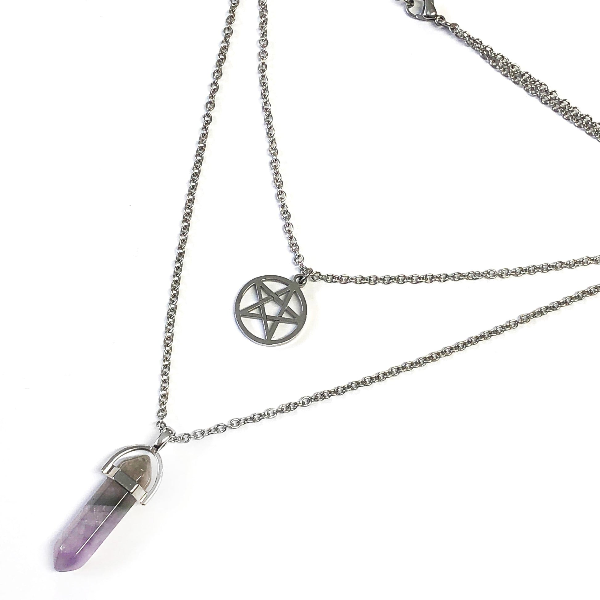 Necklace with a pentagram pendant and amethyst crystal on a white background