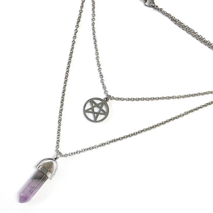 Necklace with a pentagram pendant and amethyst crystal on a white background