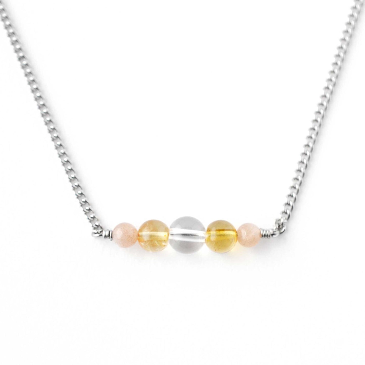 Rock Crystal, Citrine & Sunstone gemstone bar necklace on white background