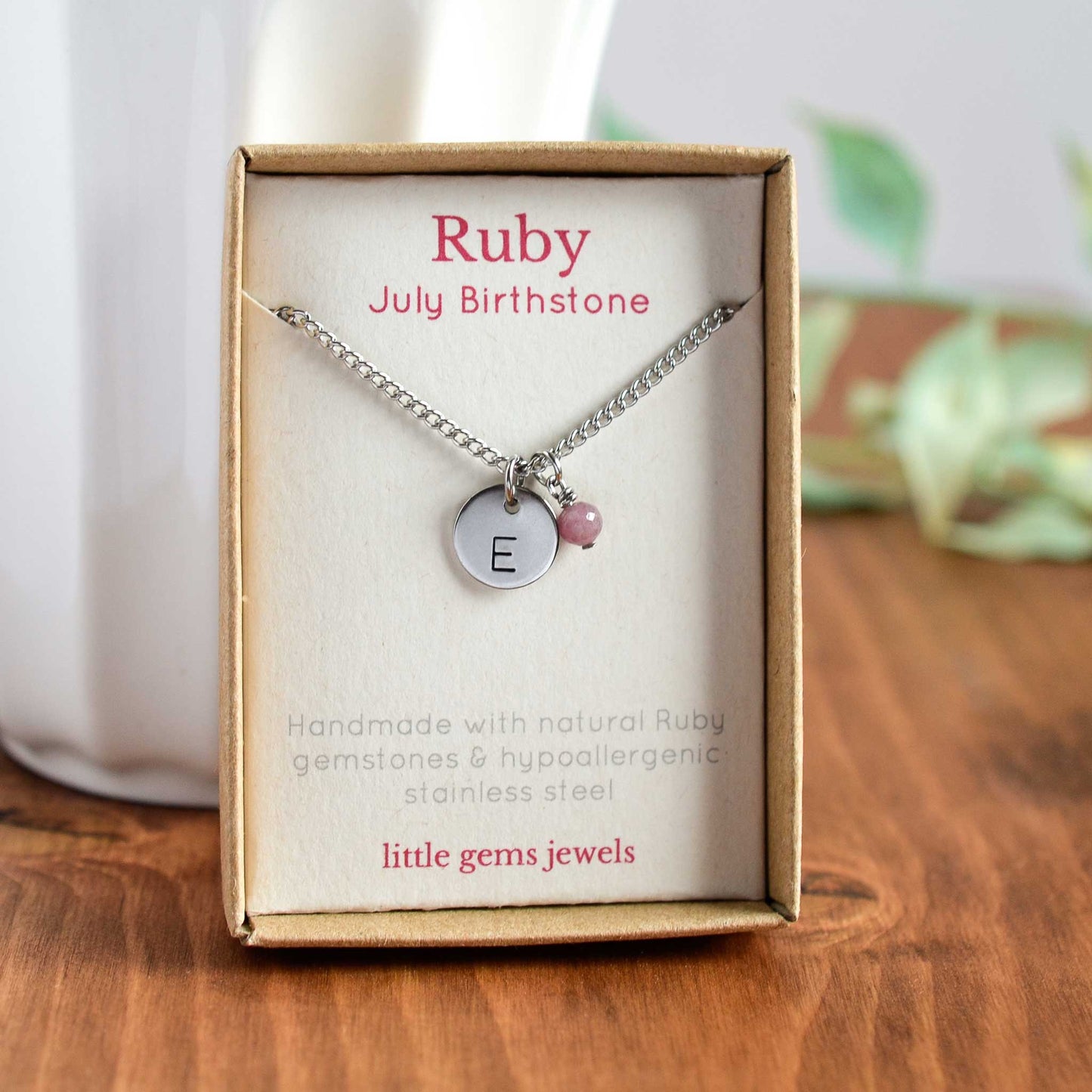 Ruby July birthstone and initial pendant necklace in gift box