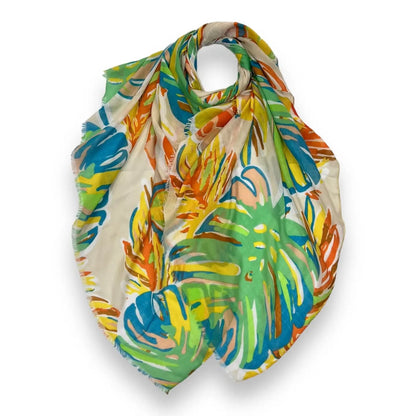 Colorful scarf with tropical leaf pattern on a white background
