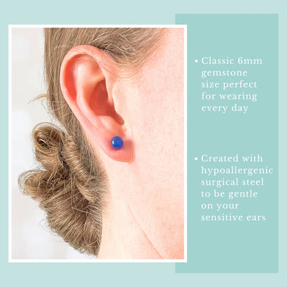 Model wearing round blue Onyx gemstone stud earring.