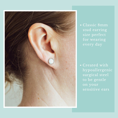Model wearing white lab Opal stud earring.