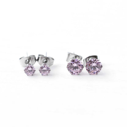 4mm & 6mm Pink CZ Stud Earrings On White Bcakground.