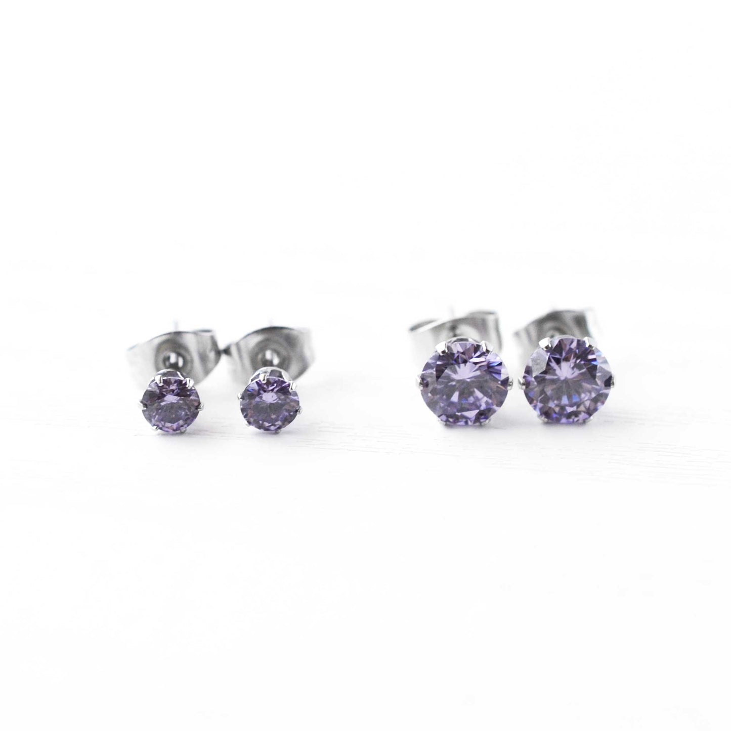 Purple CZ stud earrings in 4mm & 6mm sizes