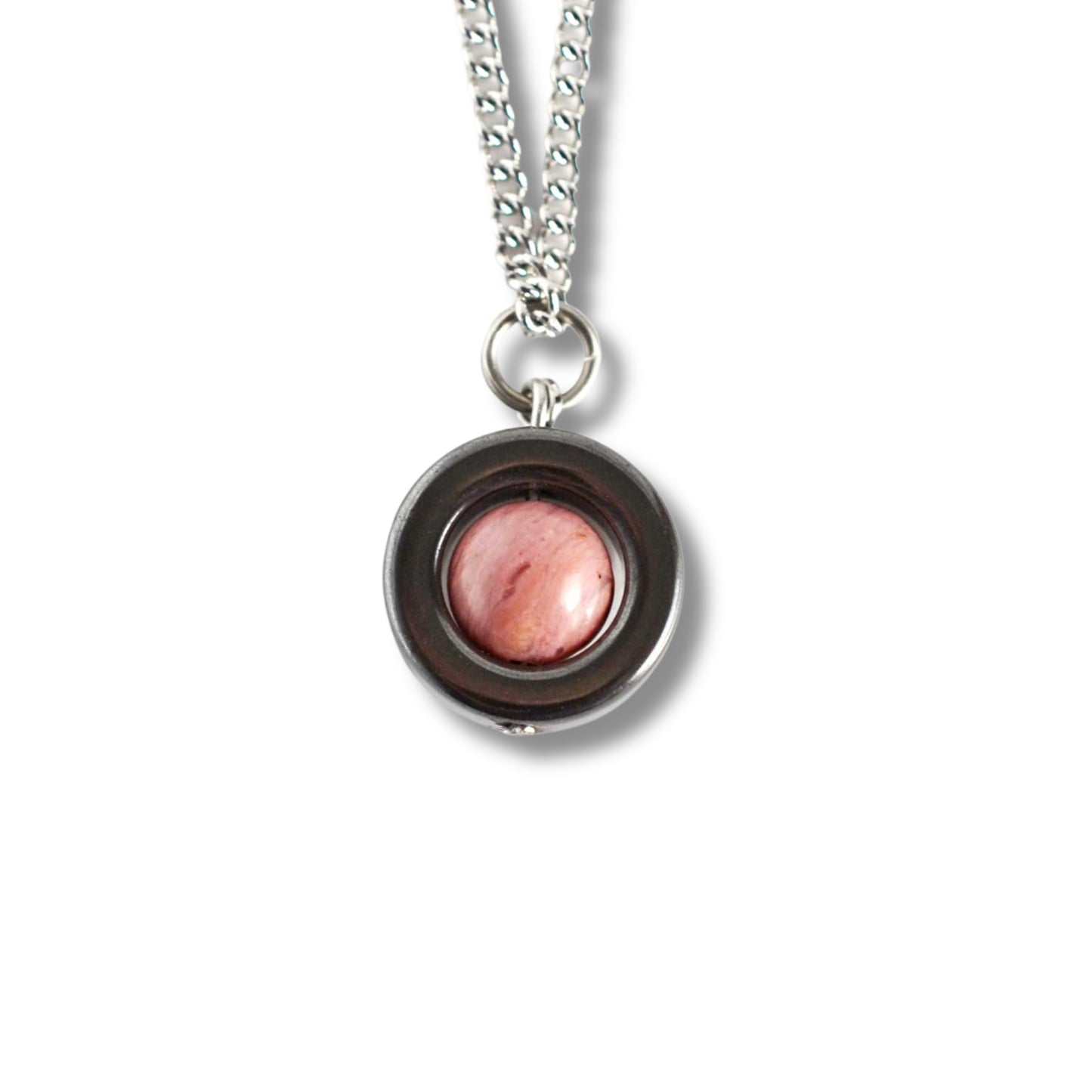 Pink Rhodonite gemstone fidget pendant necklace on white background.