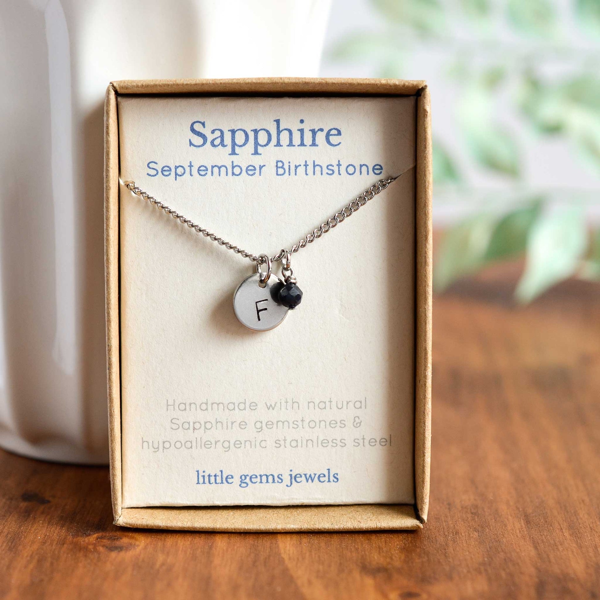 Sapphire September birthstone and initial pendant necklace in gift box