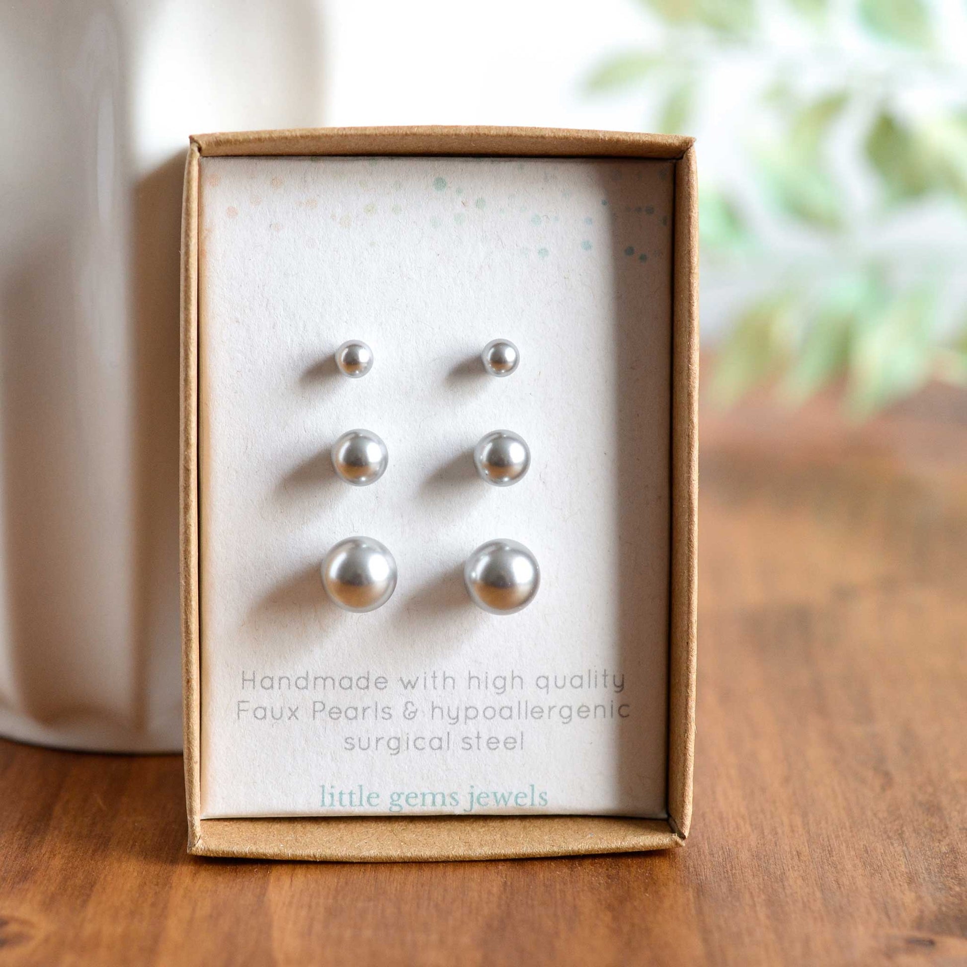 Set of three pale grey faux pearl stud earrings in eco friendly gift box