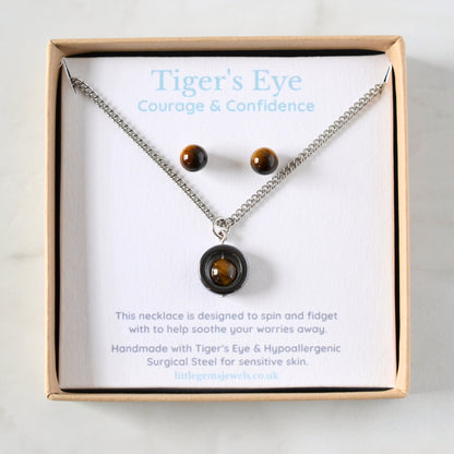 Matching Tiger's Eye spinner necklace and gemstone stud earrings set in eco friendly gift box.