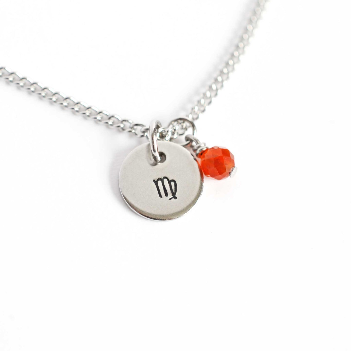 Virgo Zodiac pendant necklace with tiny Carnelian gemstone charm on white background