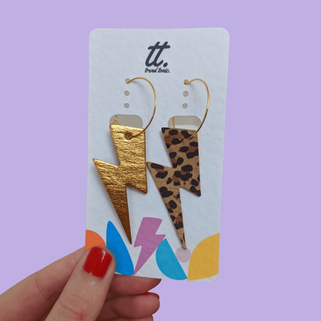 Gold and leopard lightning bolt earrings