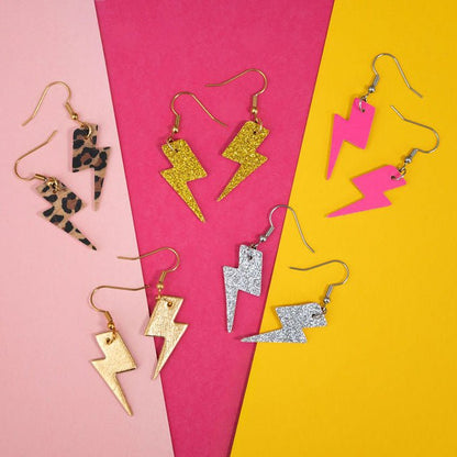 Mini gold glitter lightning bolt earrings