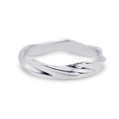 Stainless steel ring with a wavy design on a white background
