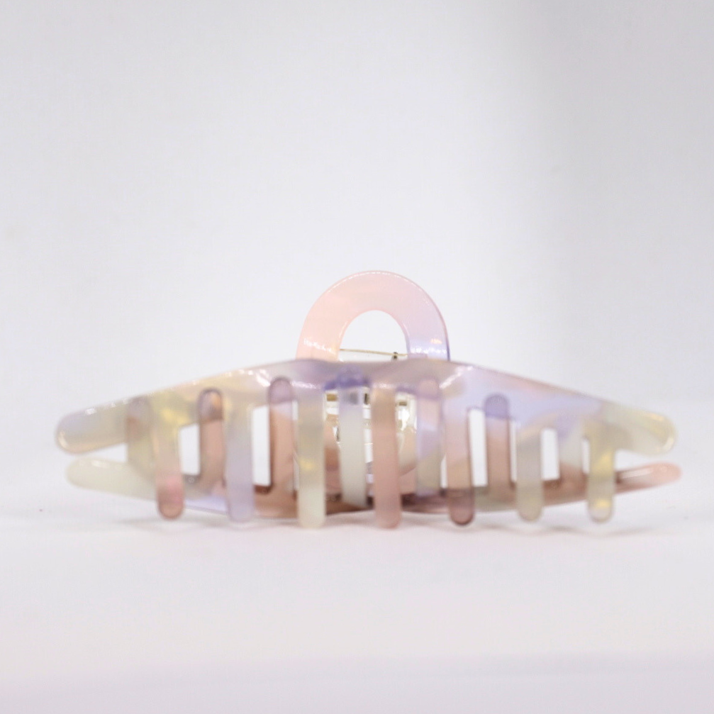 Multicolored hair clip on a white background