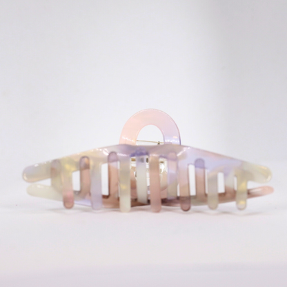 Multicolored hair clip on a white background