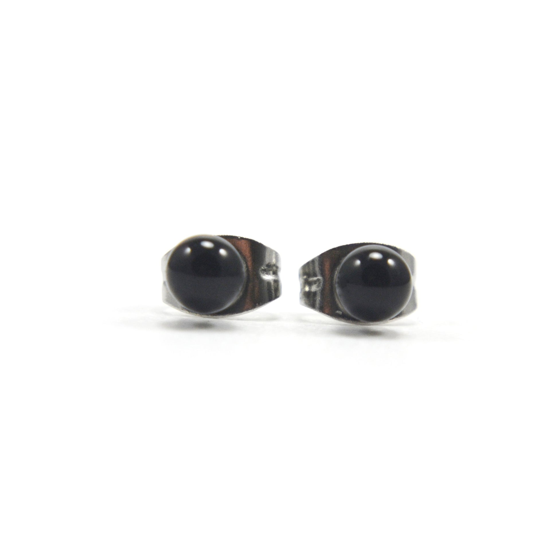 Front view of small black onyx earrings studs