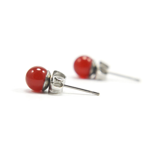 Side view of Carnelian stud earrings orange stone with hypoallergenic surgical steel posts and backs
