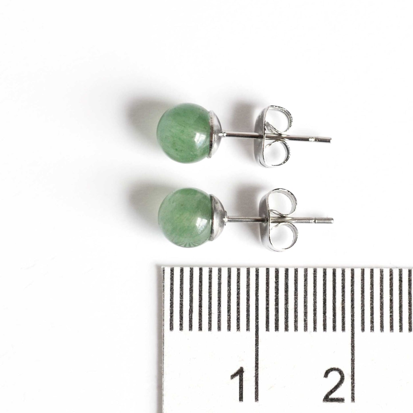 6mm Green Aventurine earrings next to ruler