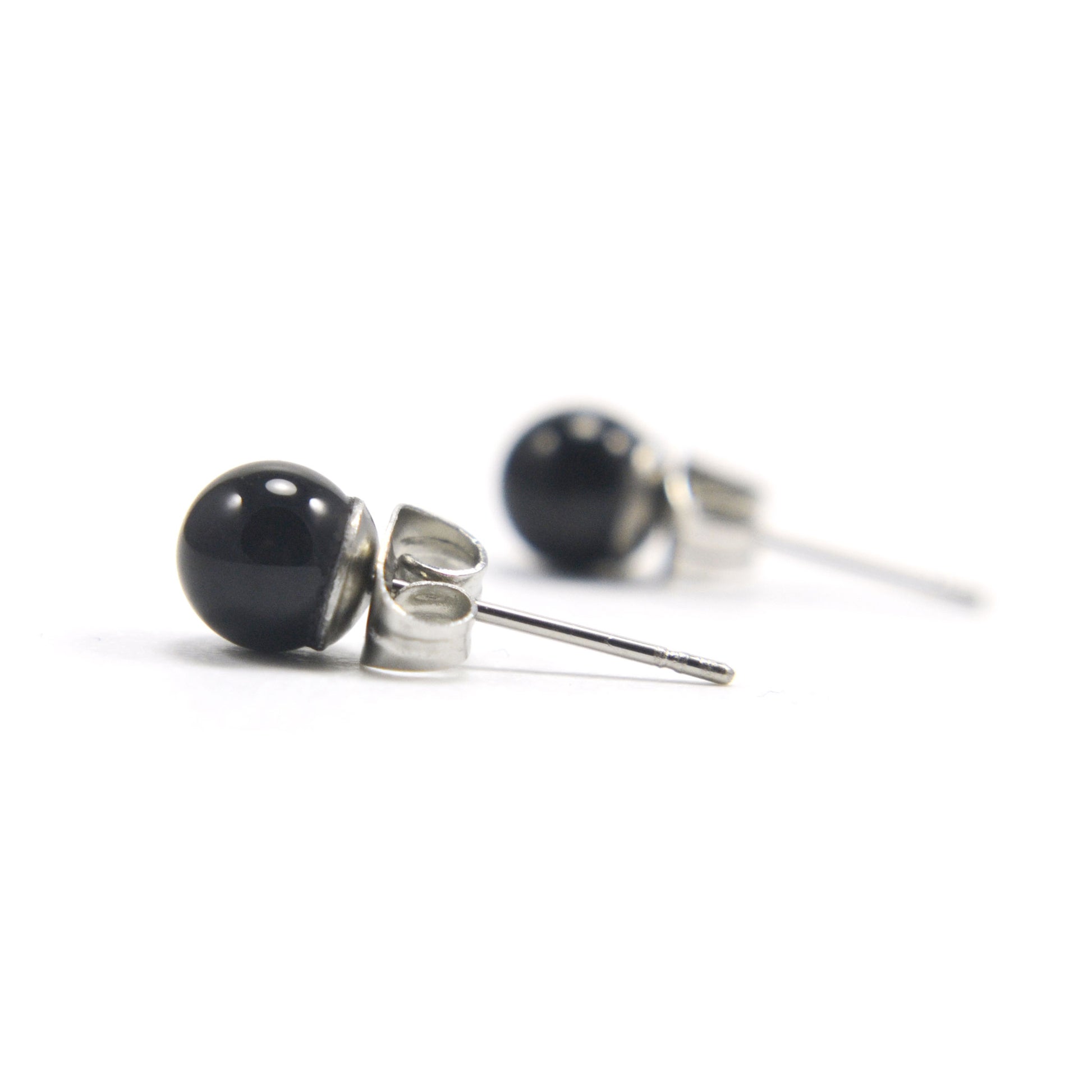 Side view of black Onyx earrings with hypoallergenic surgical steel stud posts and backs