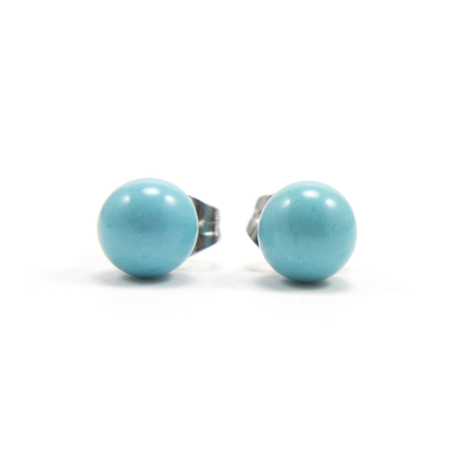 Front view of Turquoise ball stud earrings on white background
