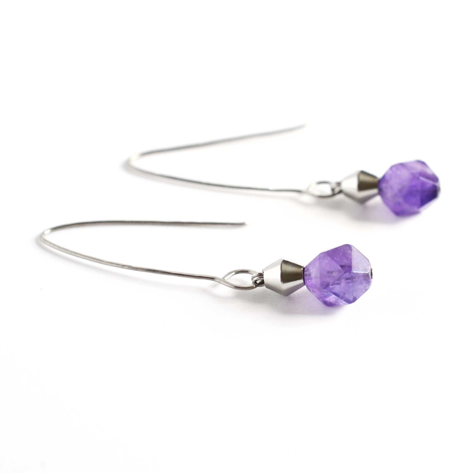 Side view of drop Amethyst earrings with curved oval Titanium hooks.